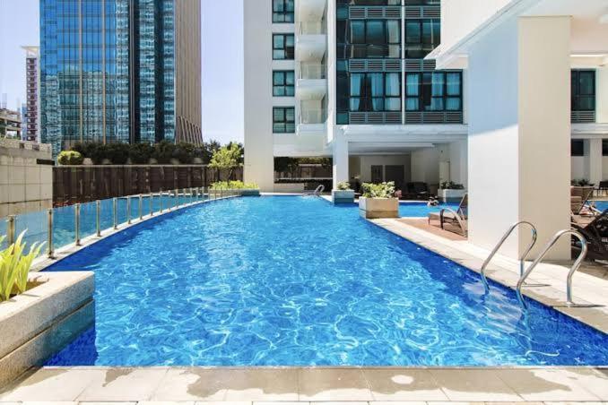 Luxestaysmnl Coastal Chic Netflx 380Mbps Pool Bgc مانيلا المظهر الخارجي الصورة